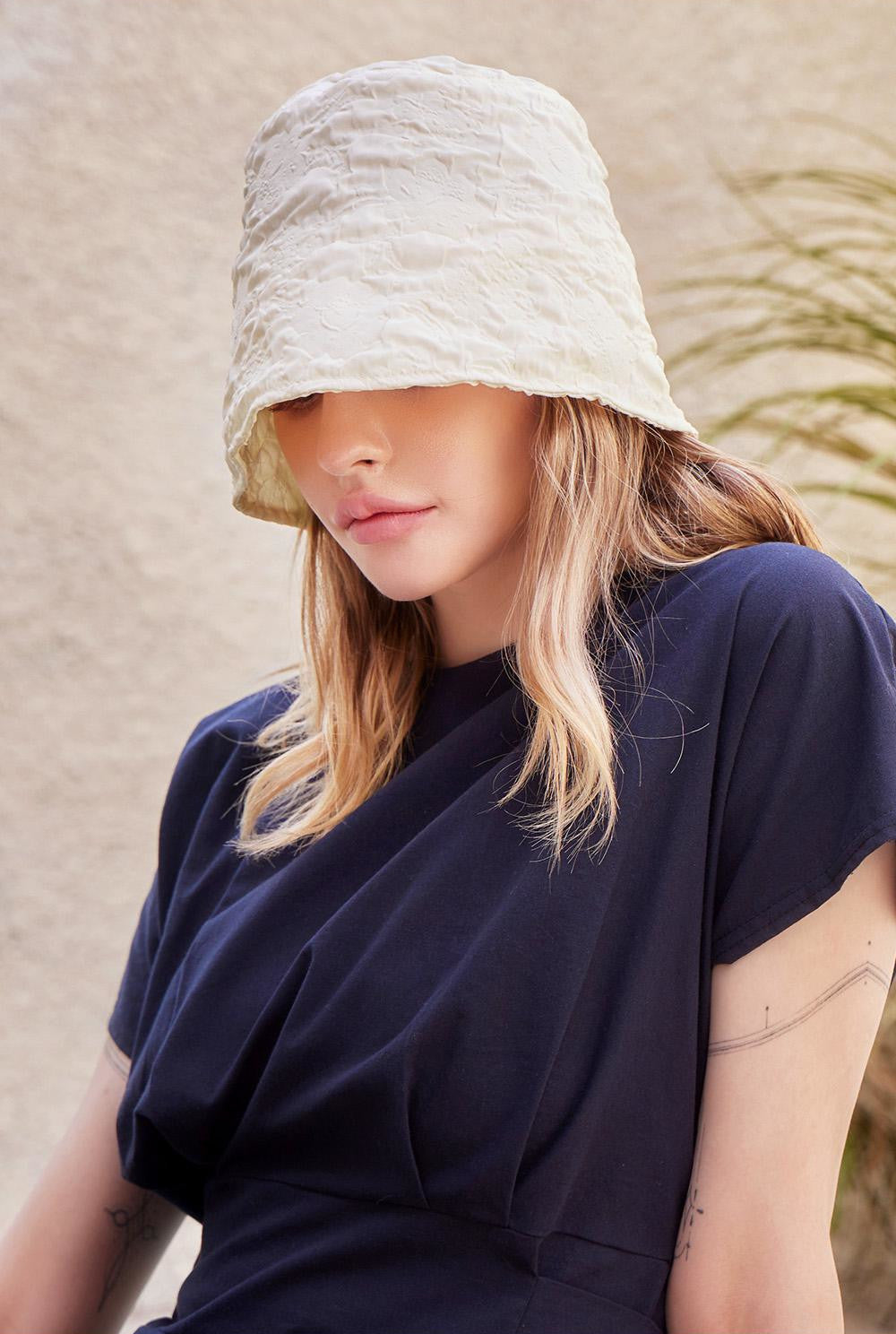 VARZAR Bucket Kat Embo Long Label Drop Bucket Hat Cream