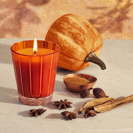 Topview Lifestyle Photo of Nest New York’s Pumpkin Chai Classic Classic Candle